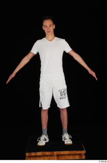  Johnny Reed dressed grey shorts sneakers sports standing white t shirt whole body 0009.jpg